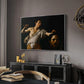 David with the Head of Goliath (Vienna Version), c. 1607 by Caravaggio in a silver floater framed canvas featuring a Baroque depiction of youth holding severed head in shadowy setting, displayed above a desk in a dark home office interior.