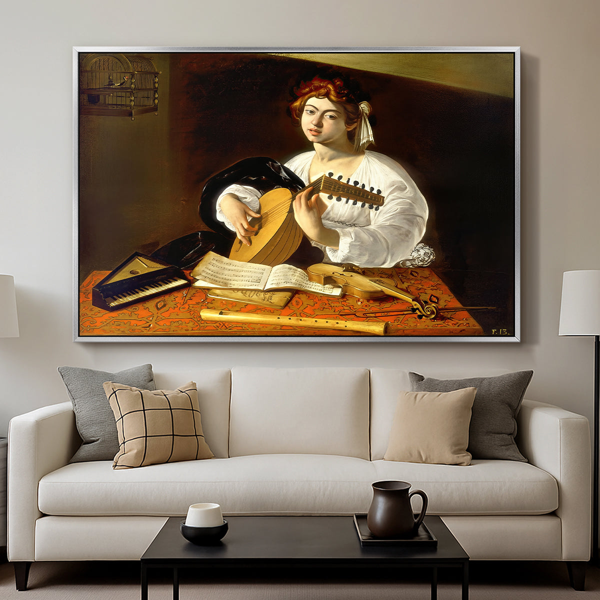 The Lute Player (Wildenstein Version), c. 1596 by Caravaggio displayed in a silver floater framed canvas above a sofa in a clean living room.