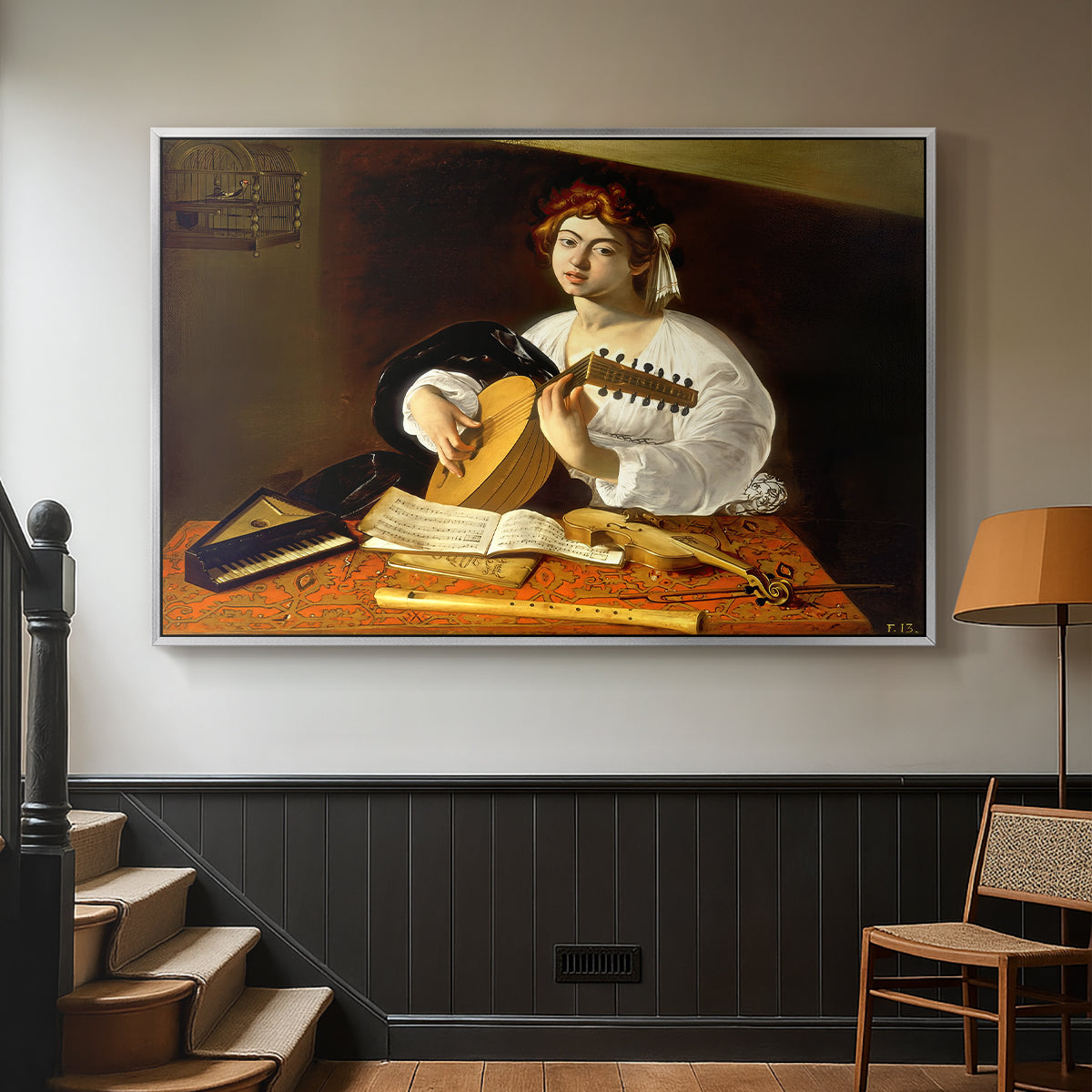 Silver floater framed canvas featuring an intimate portrait of musician with still life elements, displayed in a hallway near a staircase.