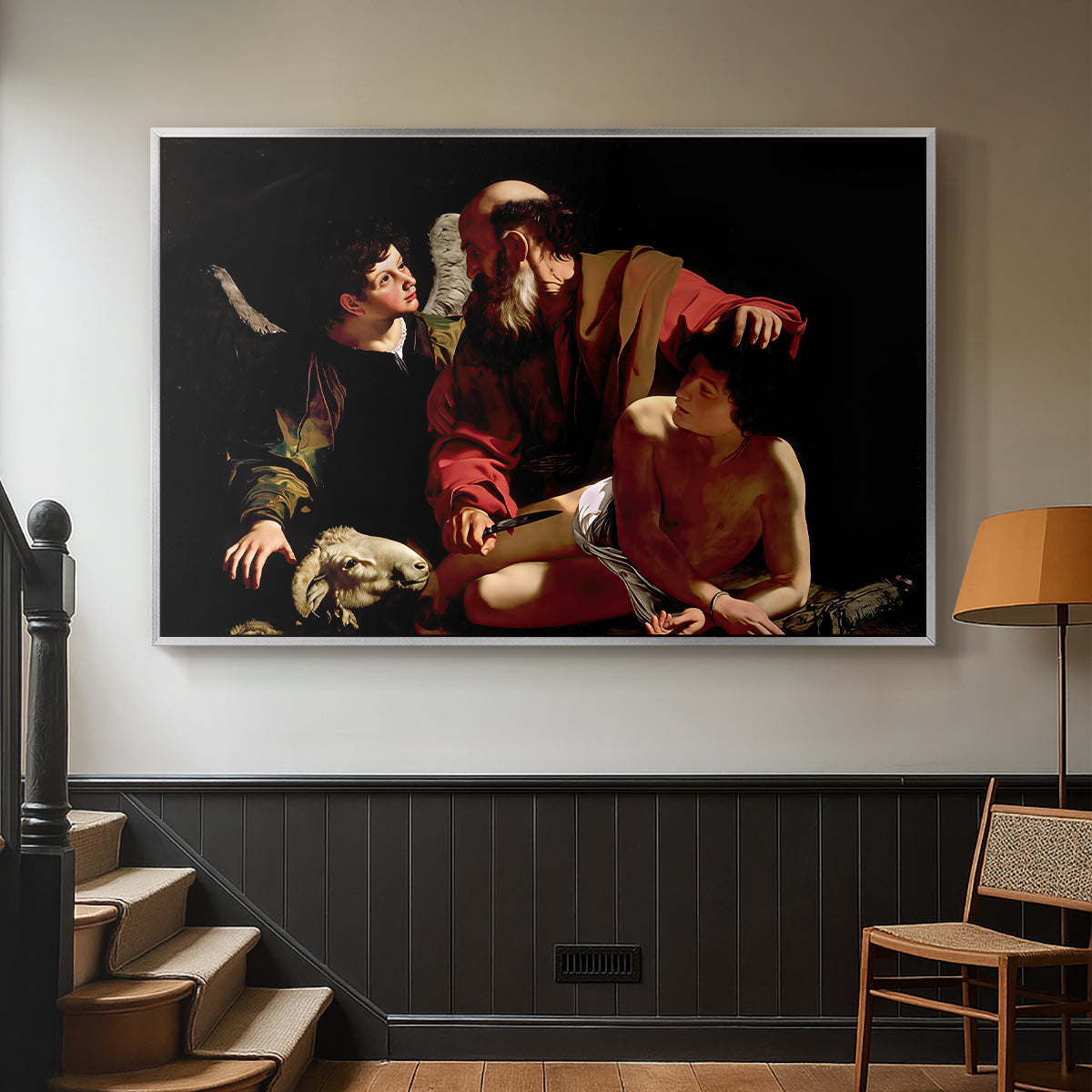 Silver floater framed canvas featuring an intense religious narrative with figures in close physical struggle, displayed in a hallway near a staircase.