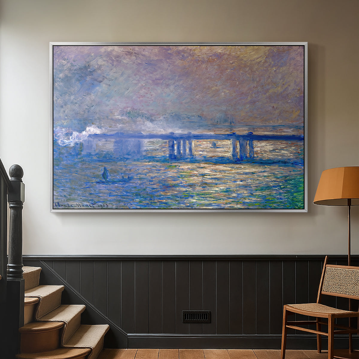 Silver floater framed canvas featuring a city bridge scene softened by mist and impressionist brushwork, displayed in a hallway near a staircase.