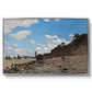 The Beach at Honfleur, 1864 by Claude Monet in a silver floater framed canvas wall art display.