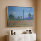 Silver floater framed canvas of Poppy Field (Giverny), 1890-1891 by Claude Monet, featuring an impressionist landscape of blooming poppies in countryside above a console cabinet in a minimalist entryway.
