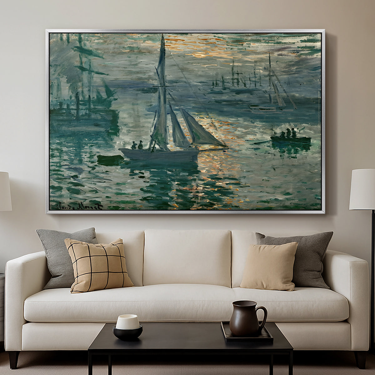 Sunrise (Marine), 1873 by Claude Monet displayed in a silver floater framed canvas above a sofa in a clean living room.