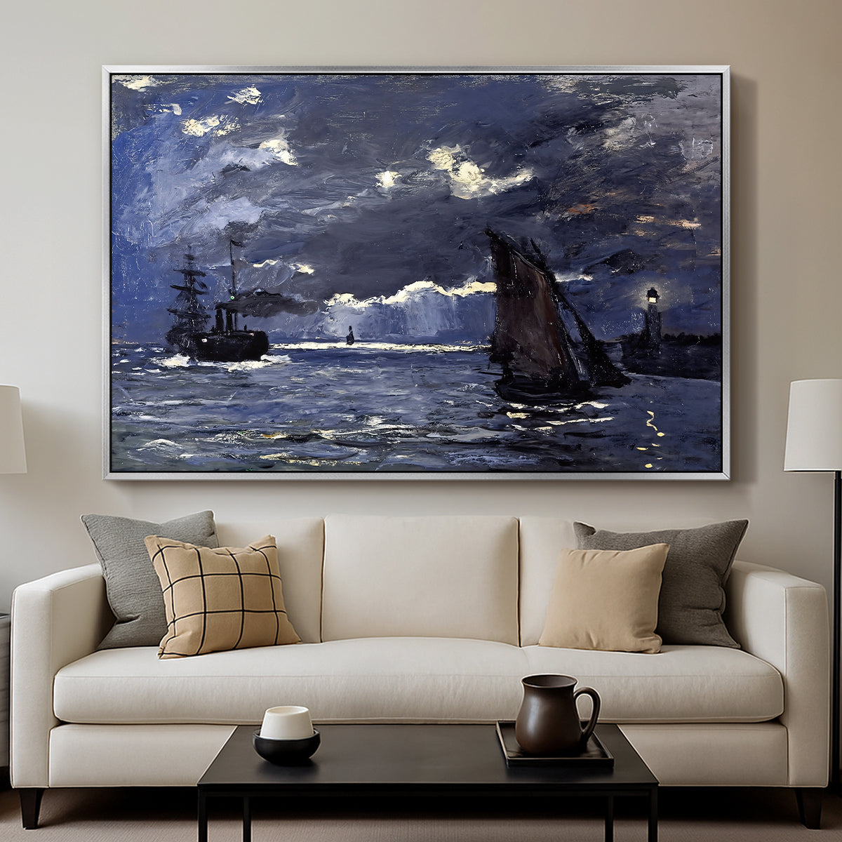 A Seascape, Shipping by Moonlight, 1864 by Claude Monet displayed in a silver floater framed canvas above a sofa in a clean living room.