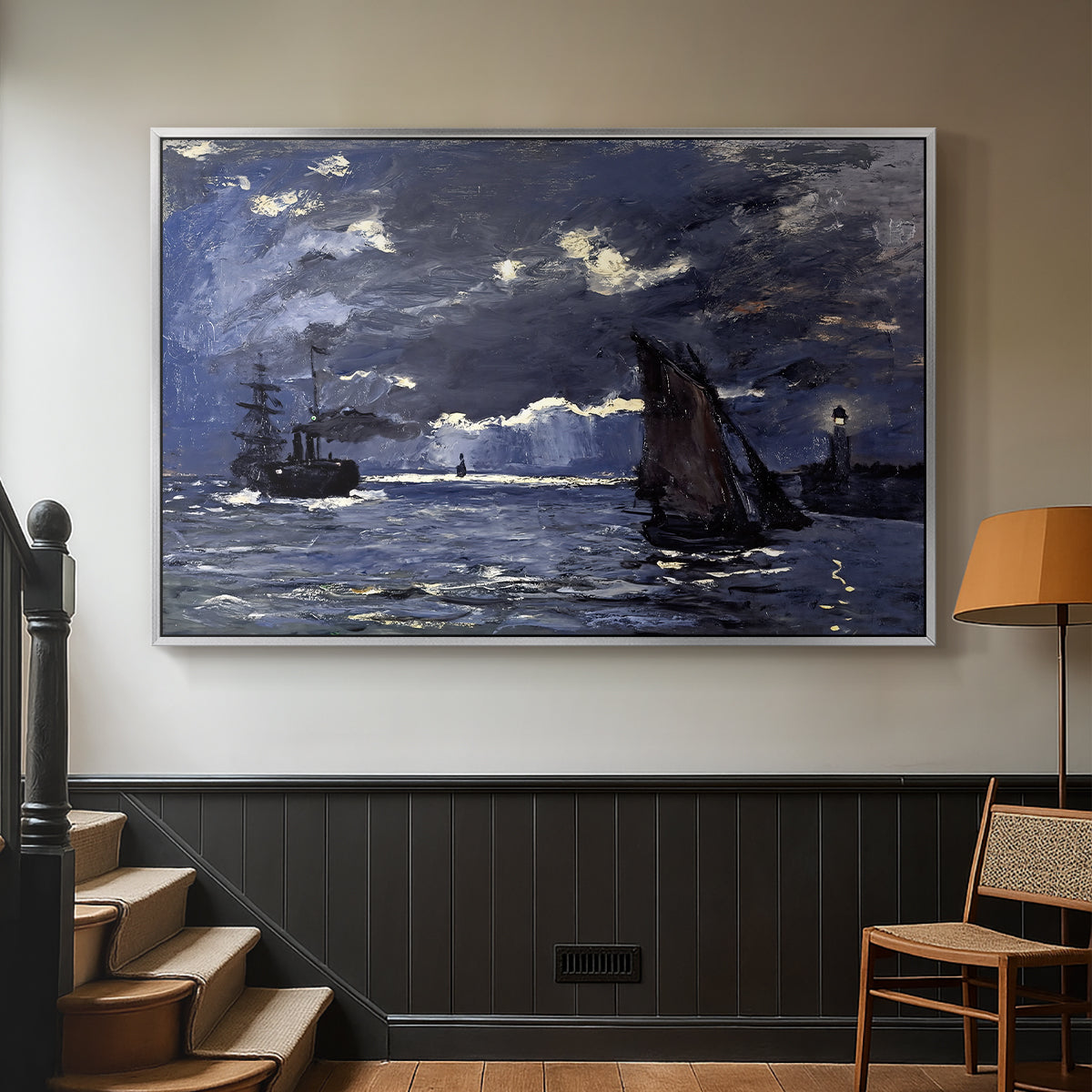 Silver floater framed canvas featuring an atmospheric maritime view with ships in moonlit darkness, displayed in a hallway near a staircase.