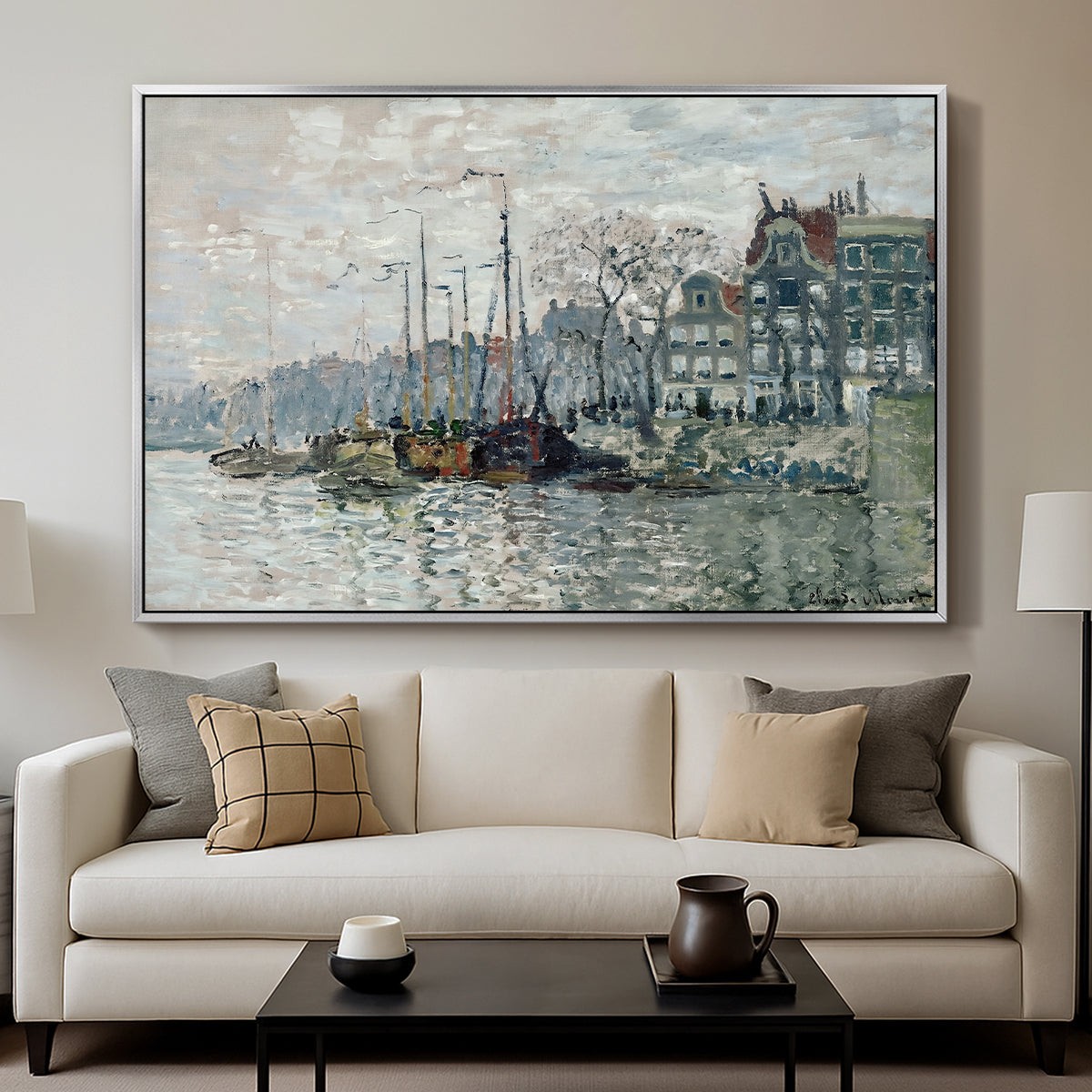 View of the Prins Hendrikkade and Kromme Waal in Amsterdam, 1874 by Claude Monet displayed in a silver floater framed canvas above a sofa in a clean living room.