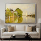 Houses on the Achterzaan, 1871 by Claude Monet displayed in a silver floater framed canvas above a sofa in a clean living room.