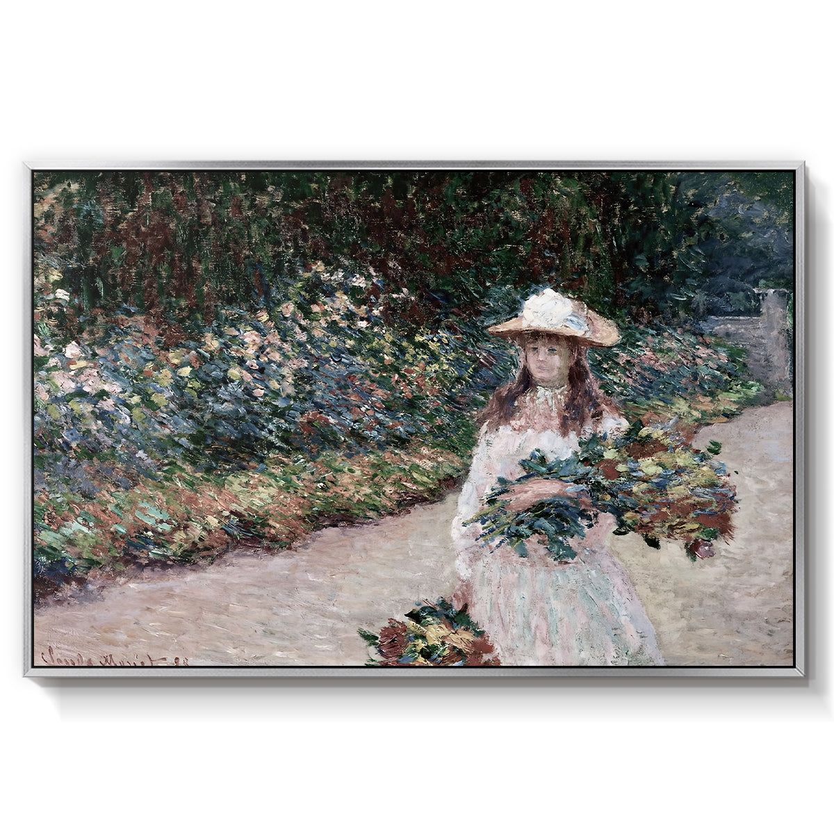 Young Girl in the Garden at Giverny, 1888 by Claude Monet in a silver floater framed canvas wall art display.