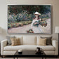 Young Girl in the Garden at Giverny, 1888 by Claude Monet displayed in a silver floater framed canvas above a sofa in a clean living room.