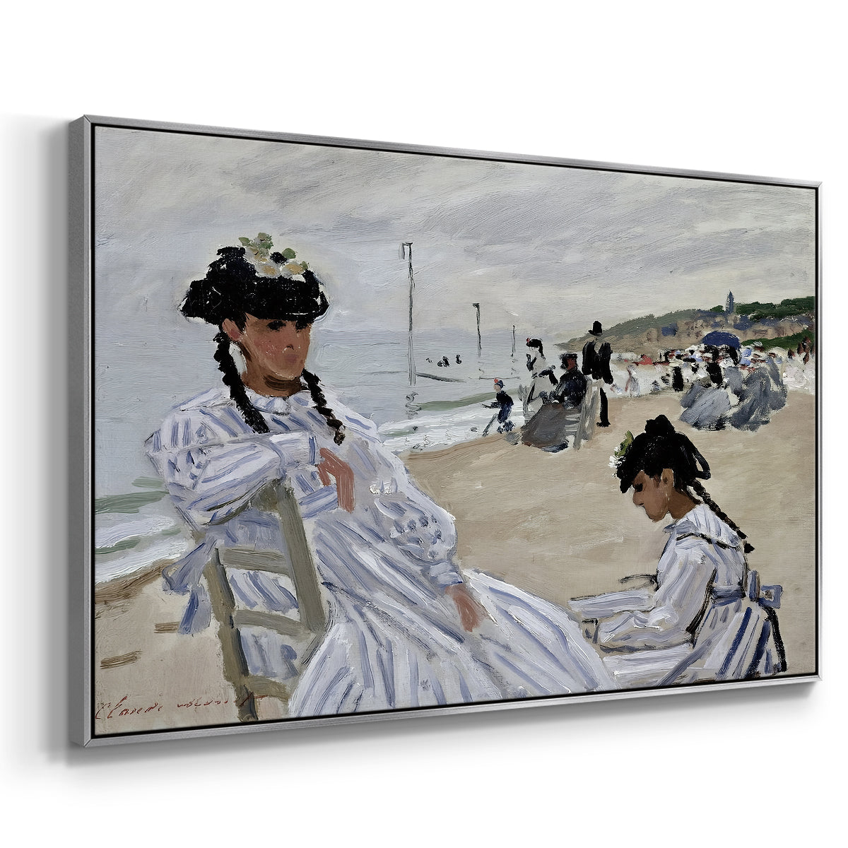 Angled view of On the Beach at Trouville, 1870 by Claude Monet in a silver floater framed canvas.