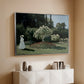 Silver floater framed canvas of Woman in the Garden, Sainte-Adresse, 1867 by Claude Monet, featuring an impressionist figure in sunlit garden with lush vegetation above a console cabinet in a minimalist entryway.