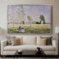 Summer (L'ete), 1874 by Claude Monet displayed in a silver floater framed canvas above a sofa in a clean living room.