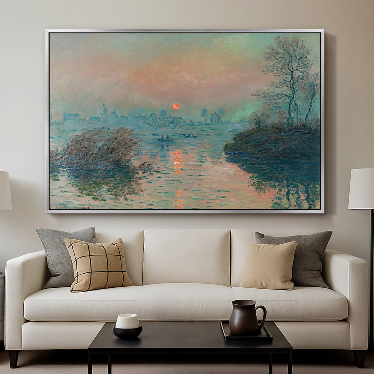 Sunset on the Seine at Lavacourt, Winter Effect, 1880 by Claude Monet displayed in a silver floater framed canvas above a sofa in a clean living room.