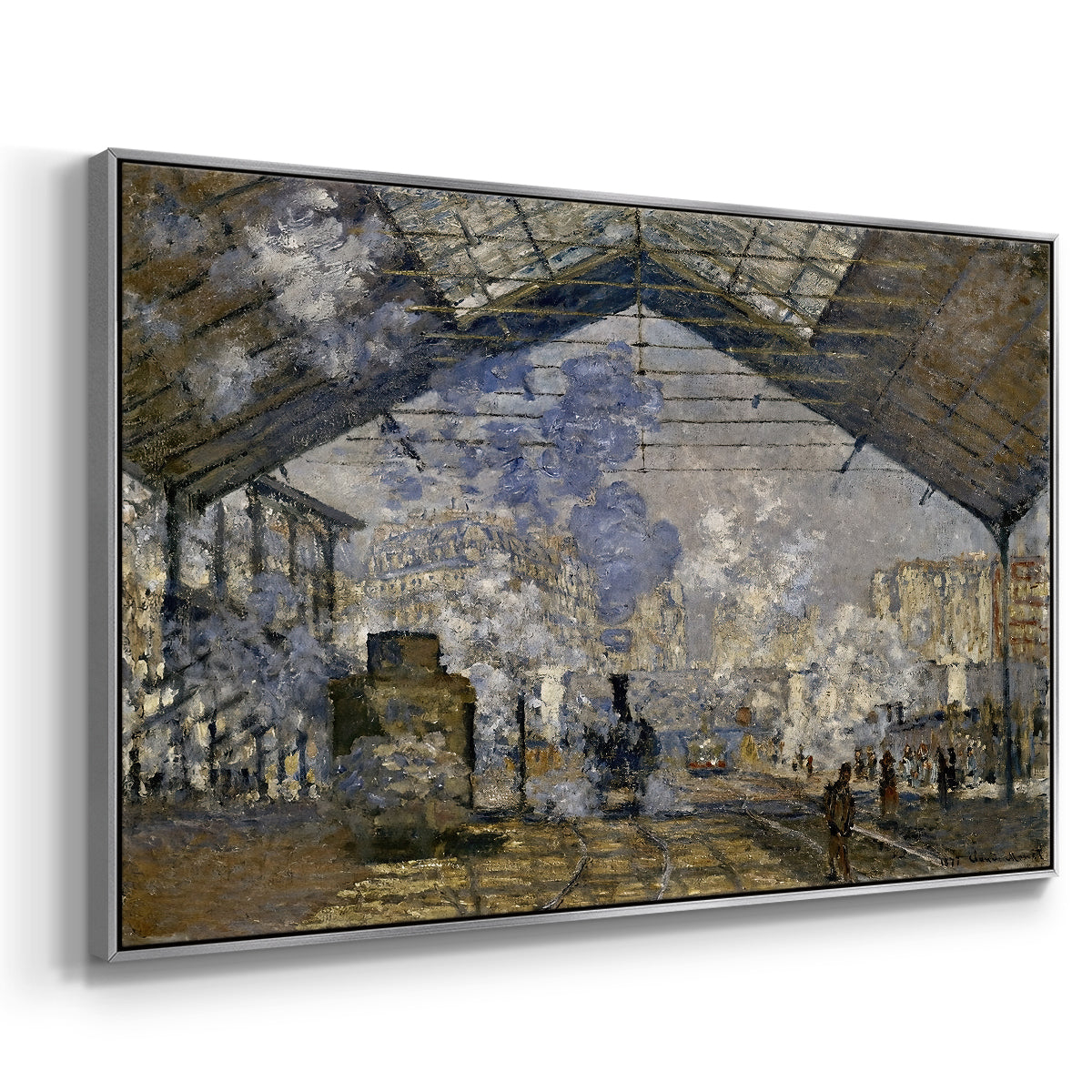 Angled view of The Gare Saint-Lazare, 1877 by Claude Monet in a silver floater framed canvas.