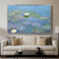 Water Lilies (Nymphéas), 1897-1899 by Claude Monet displayed in a silver floater framed canvas above a sofa in a clean living room.