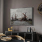 Windmills near Zaandam, 1871 by Claude Monet in a silver floater framed canvas featuring a countryside scene with traditional windmills and reflections, displayed above a desk in a dark home office interior.