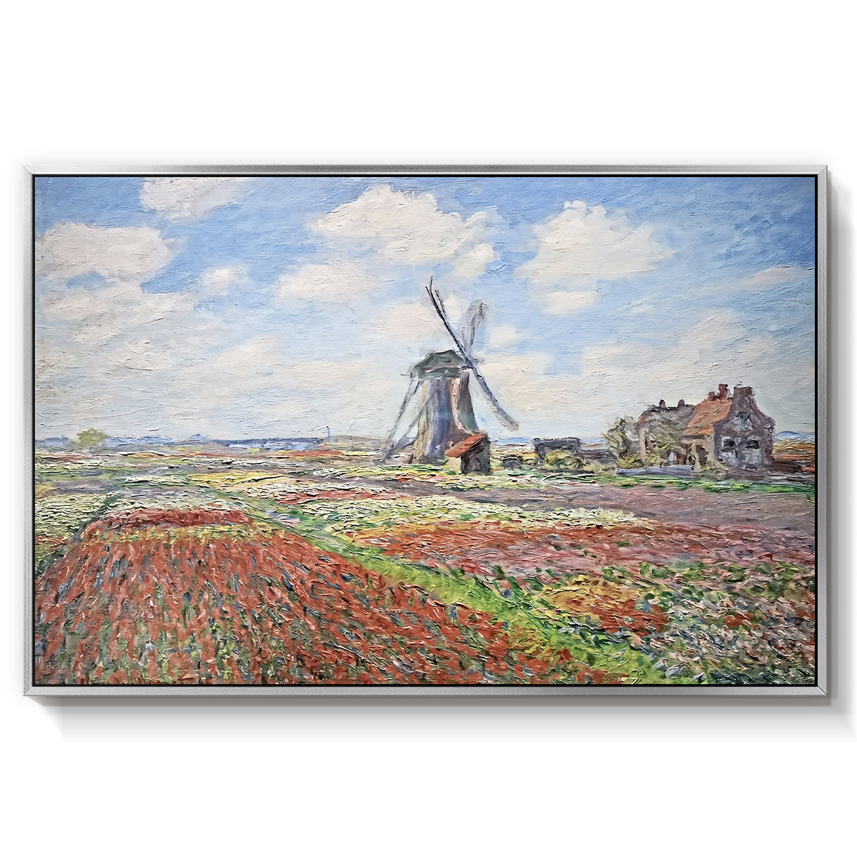 Tulip Fields with the Rijnsburg Windmill, 1886 by Claude Monet in a silver floater framed canvas wall art display.