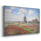 Angled view of Tulip Fields with the Rijnsburg Windmill, 1886 by Claude Monet in a silver floater framed canvas.