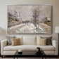 The Boulevard de Pontoise at Argenteuil, Snow Effect, 1875 by Claude Monet displayed in a silver floater framed canvas above a sofa in a clean living room.