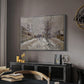 The Boulevard de Pontoise at Argenteuil, Snow Effect, 1875 by Claude Monet in a silver floater framed canvas featuring a quiet boulevard blanketed in snow with distant figures, displayed above a desk in a dark home office interior.