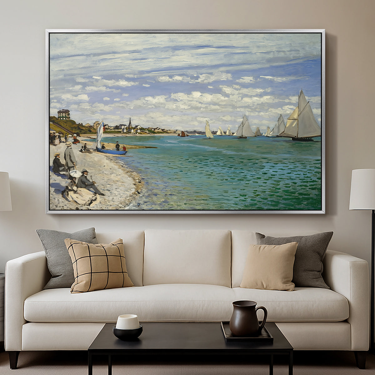 Regatta at Sainte-Adresse, 1867 by Claude Monet displayed in a silver floater framed canvas above a sofa in a clean living room.