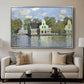 Houses on the Zaan River at Zaandam, 1871 by Claude Monet displayed in a silver floater framed canvas above a sofa in a clean living room.