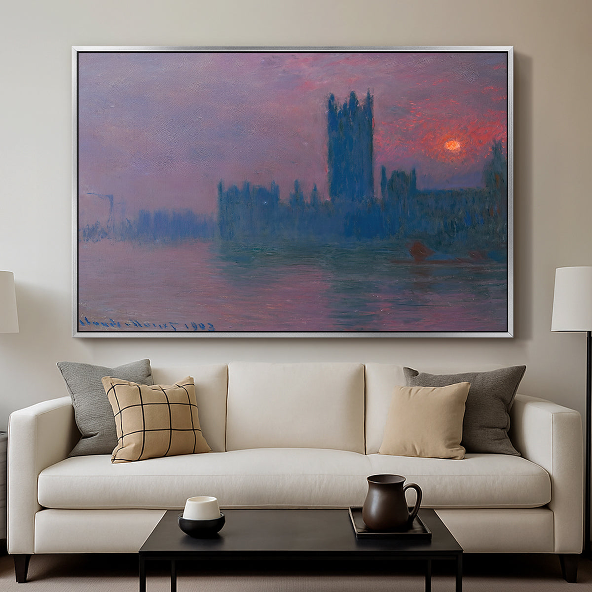 The Houses of Parliament, Sunset, 1903 by Claude Monet displayed in a silver floater framed canvas above a sofa in a clean living room.