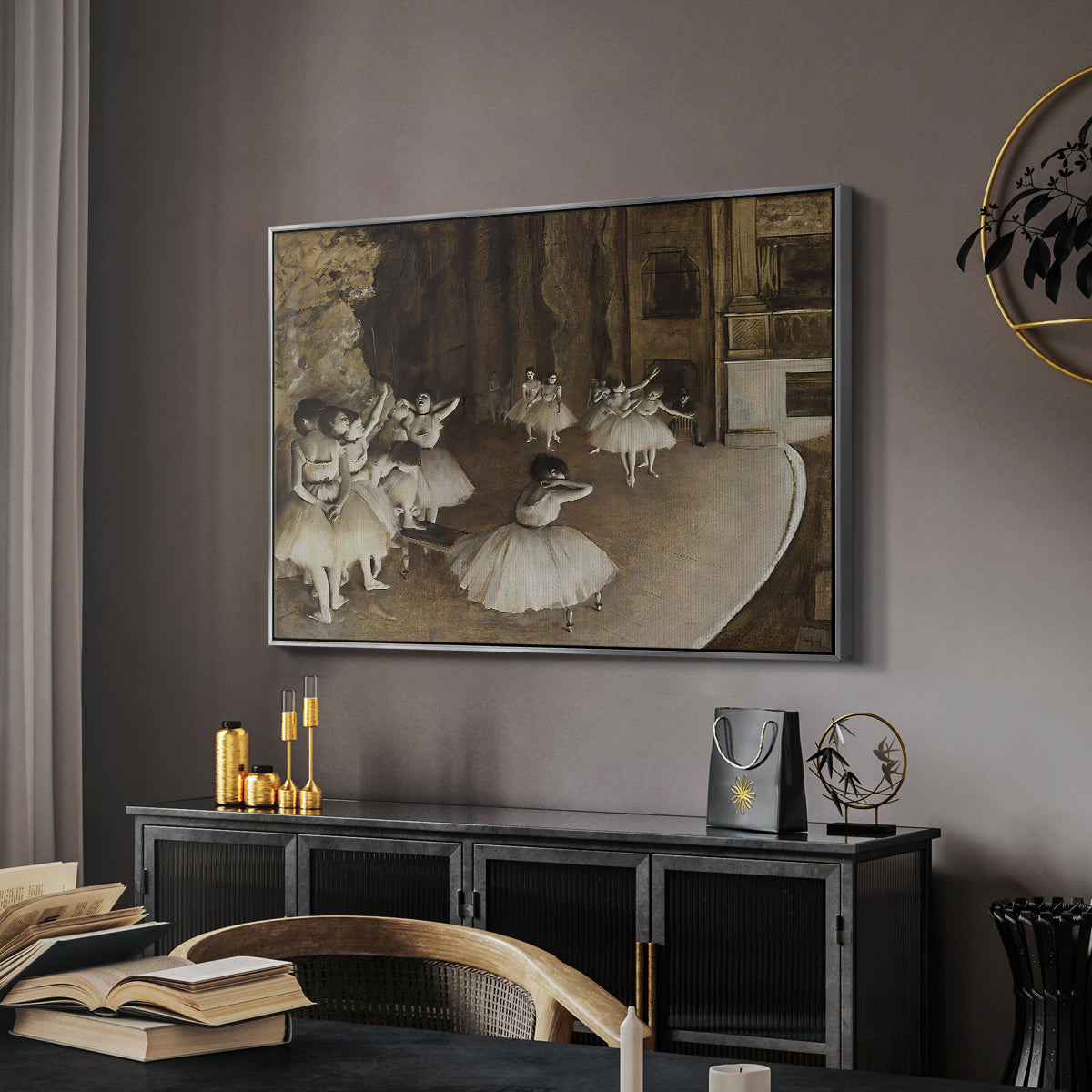 The Rehearsal of the Ballet Onstage, 1874 by Edgar Degas in a silver floater framed canvas featuring an impressionist depiction of ballet practice on theater stage, displayed above a desk in a dark home office interior.