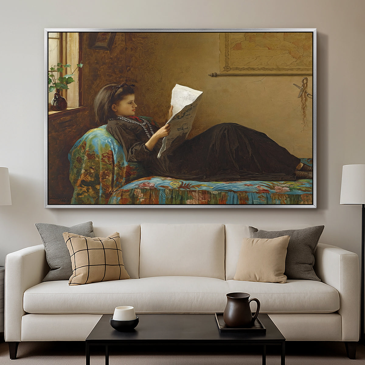 Interesting News, 1872 by Eastman Johnson displayed in a silver floater framed canvas above a sofa in a clean living room.