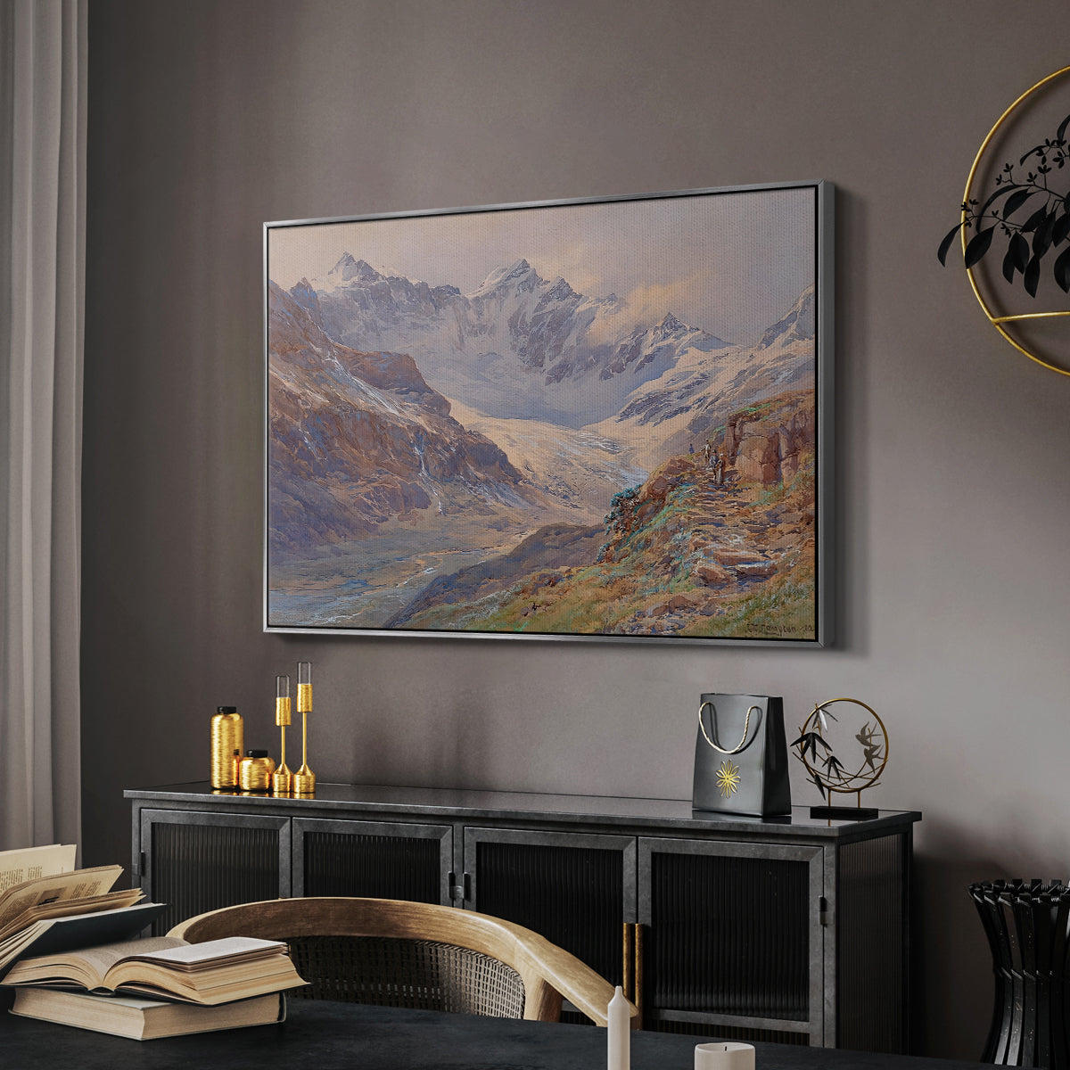 Odenwinklkees with the Johannisberg, 1902 by Edward Theodore Compton in a silver floater framed canvas featuring a realistic depiction of high-altitude snowy peaks, displayed above a desk in a dark home office interior.