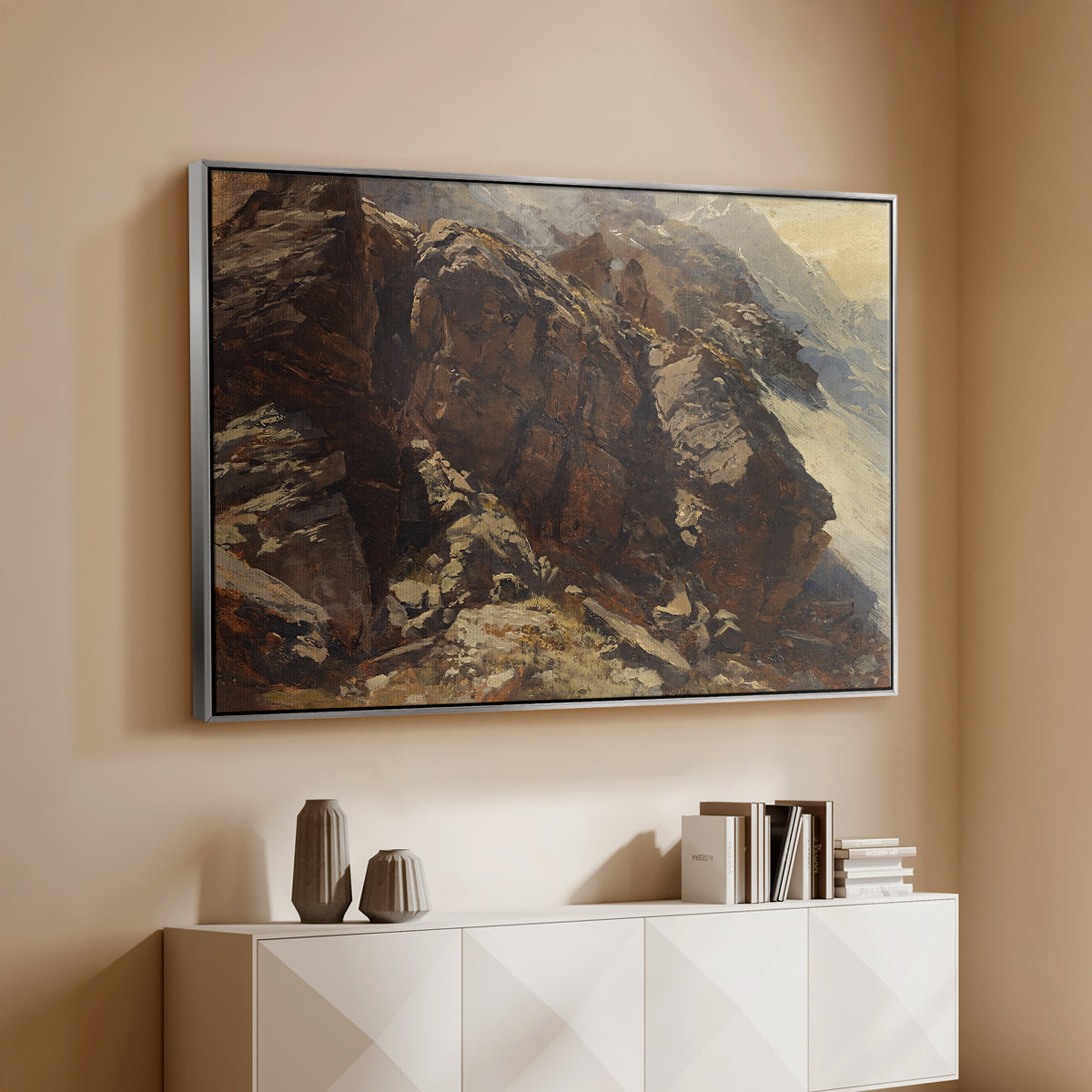 Silver floater framed canvas of High Mountain Study, c. 1870 by Edward Theodore Compton, featuring a detailed study of rugged mountain landscape with sharp contours above a console cabinet in a minimalist entryway.