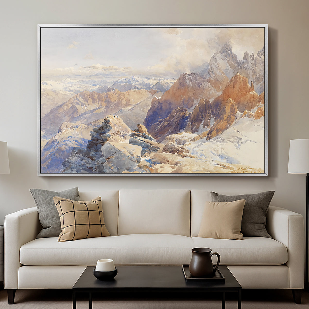 Col du Géant, 1903 by Edward Theodore Compton displayed in a silver floater framed canvas above a sofa in a clean living room.