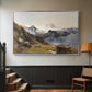 Silver floater framed canvas featuring a scenic mountain view with dramatic elevation and depth, displayed in a hallway near a staircase.