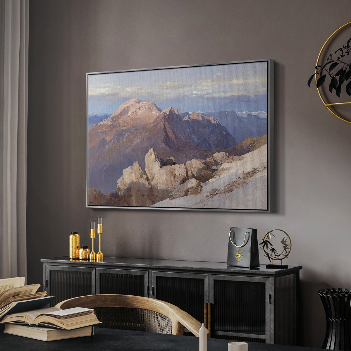Hoher Göll from Watzmann-Hocheck, 1919 by Edward Theodore Compton in a silver floater framed canvas featuring a high vantage point overlooking rugged mountain terrain, displayed above a desk in a dark home office interior.