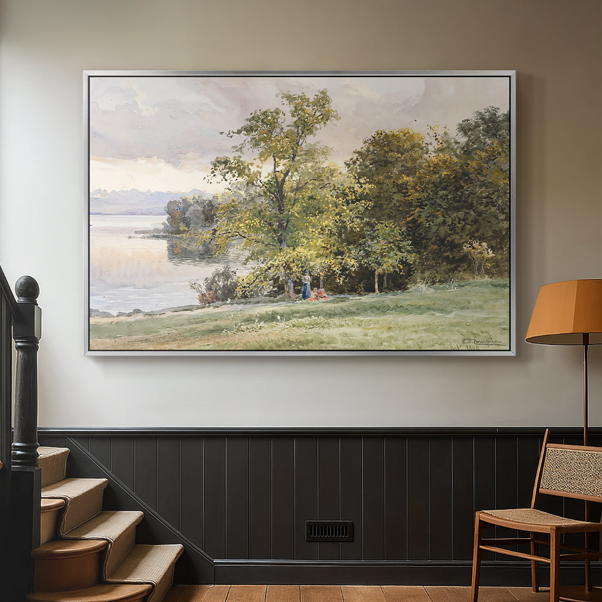 Silver floater framed canvas featuring a tranquil lakeside view with soft atmospheric tones, displayed in a hallway near a staircase.