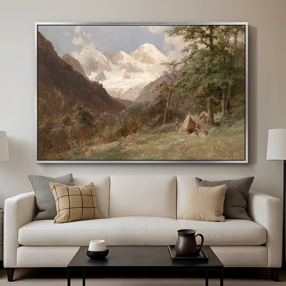 Landscape in the Caucasus, c. 1921 by Edward Theodore Compton displayed in a silver floater framed canvas above a sofa in a clean living room.