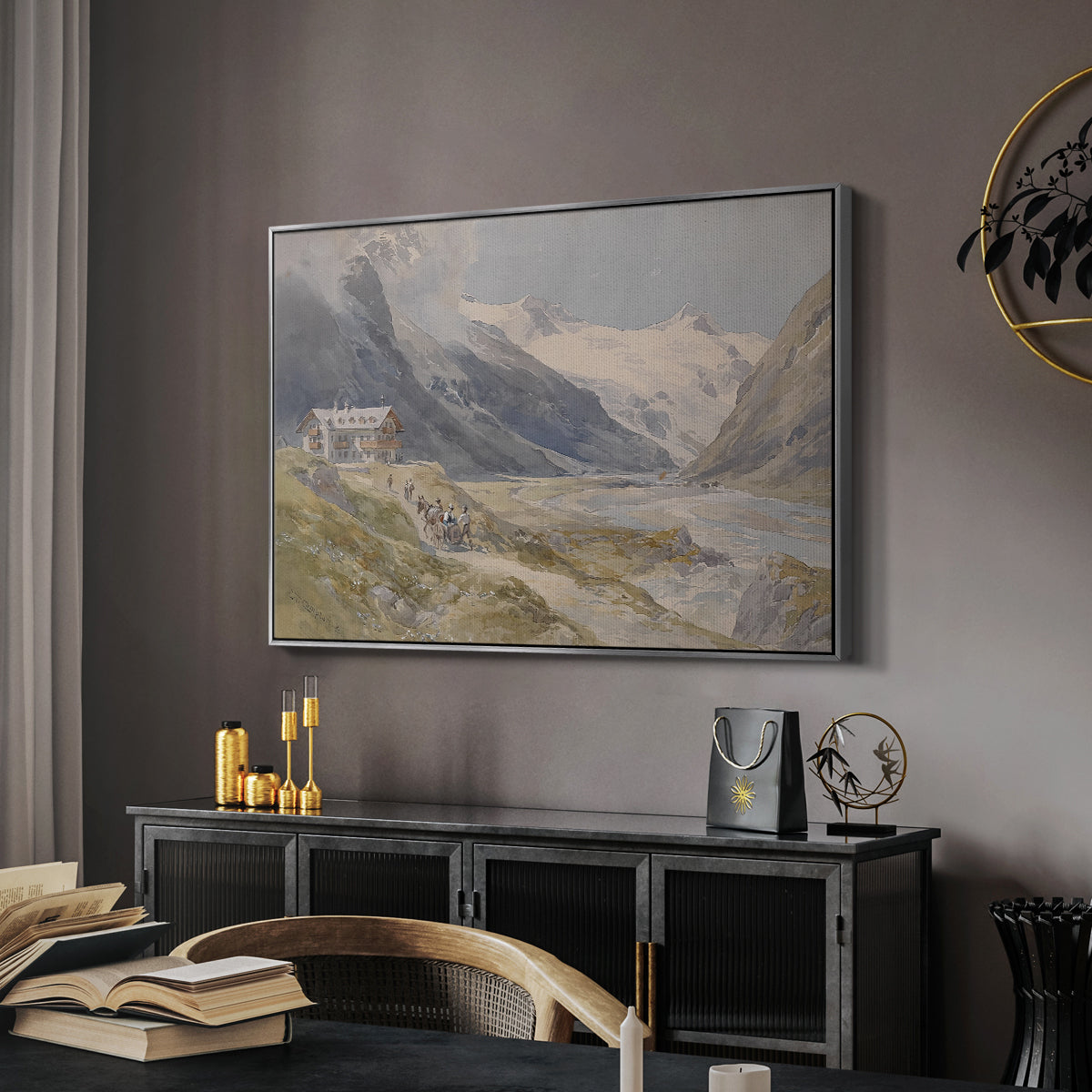 Shepherds (Pasterze), c. 1921 by Edward Theodore Compton in a silver floater framed canvas featuring a rural alpine setting with shepherds and open terrain, displayed above a desk in a dark home office interior.