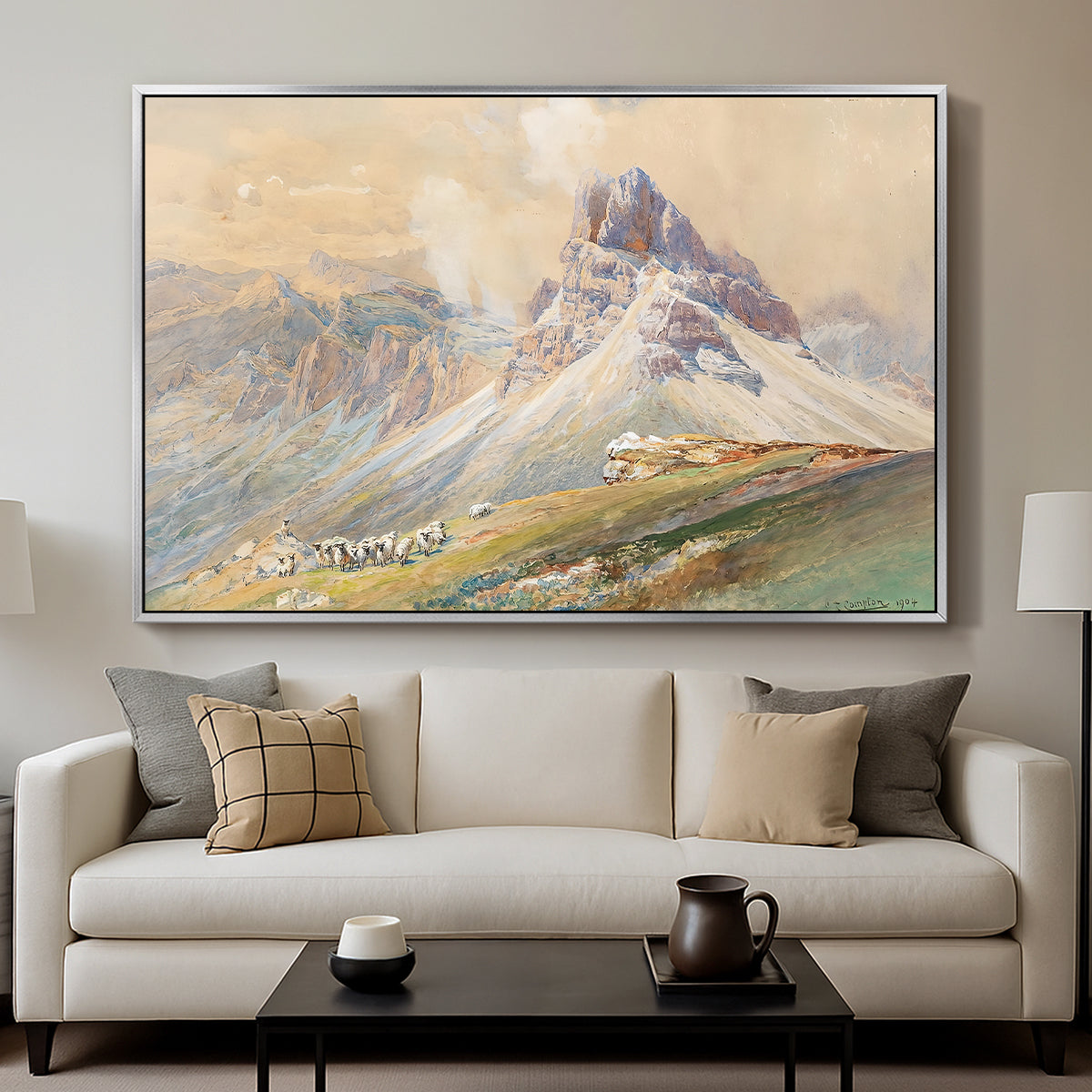 From the Dolomites, 1904 by Edward Theodore Compton displayed in a silver floater framed canvas above a sofa in a clean living room.