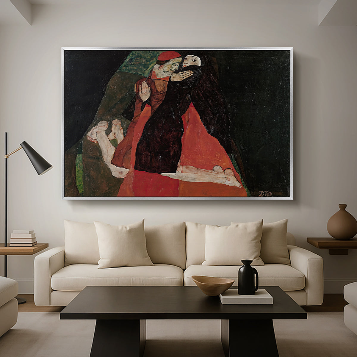Cardinal and Nun (Caress), 1912 by Egon Schiele as a silver floater framed canvas featuring two figures embracing intimately in stylized expressionist composition, displayed above a sofa in a modern living room.