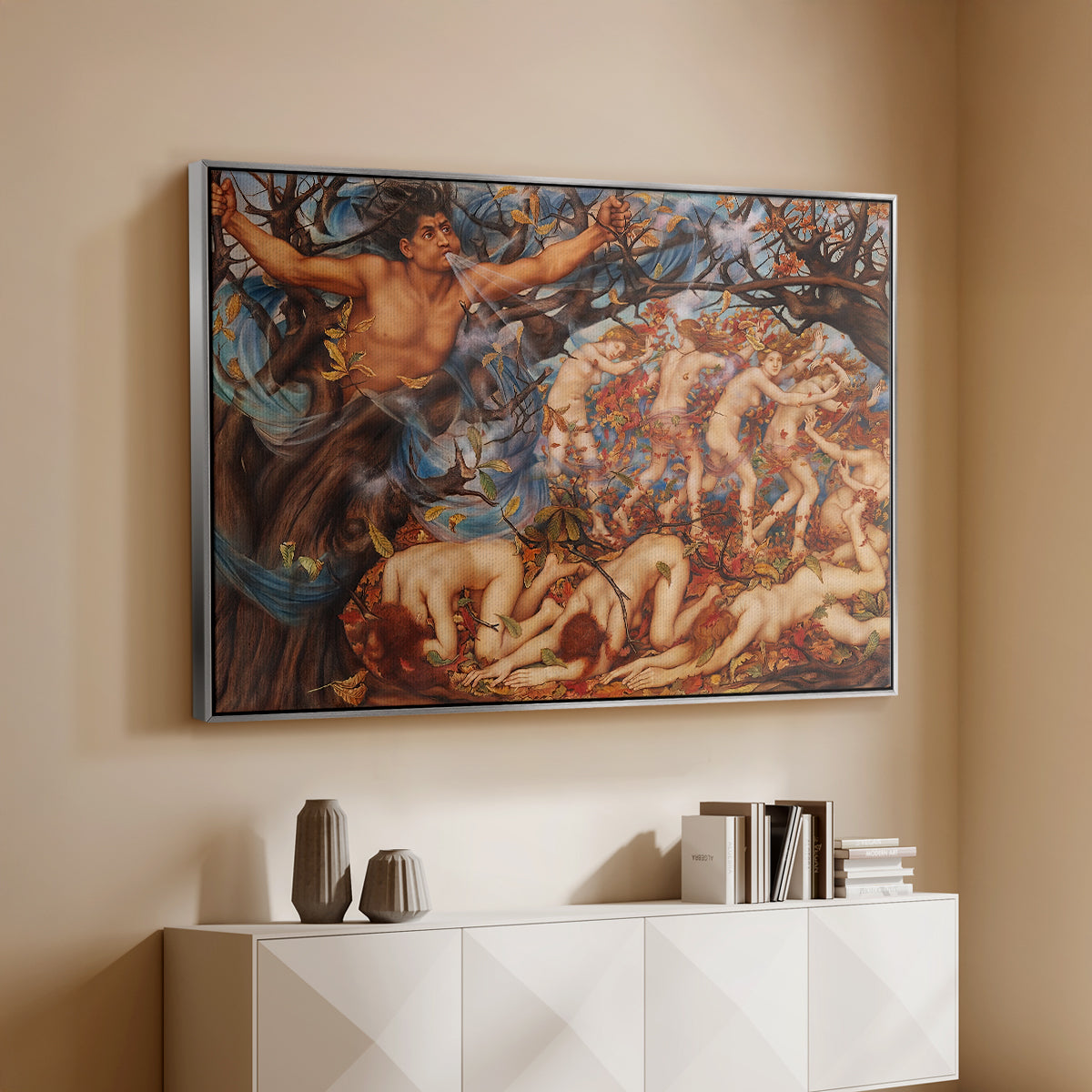 Silver floater framed canvas of Boreas and the Fallen Leaves, c. 1910-1914 by Evelyn De Morgan, featuring a mythological scene of wind god Boreas moving through autumn leaves above a console cabinet in a minimalist entryway.