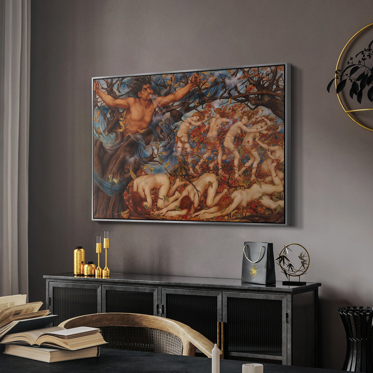 Boreas and the Fallen Leaves, c. 1910-1914 by Evelyn De Morgan in a silver floater framed canvas featuring an energetic depiction of figures swept through air by wind, displayed above a desk in a dark home office interior.