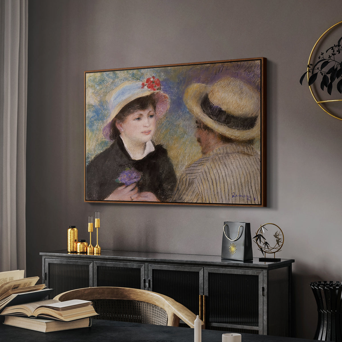Boating Couple (Aline Charigot and Renoir), c. 1881 by Pierre-Auguste Renoir in a walnut floater framed canvas featuring an impressionist depiction of couple enjoying leisure time near water, displayed above a desk in a dark home office interior.