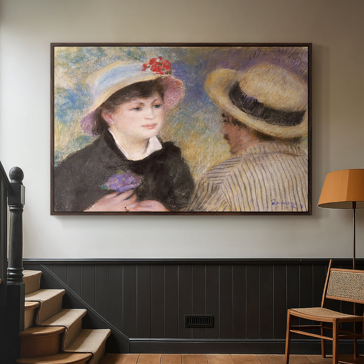 Walnut floater framed canvas featuring a romantic scene of two figures in casual conversation with soft light, displayed in a hallway near a staircase.