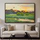 Flying Duck at Sunset, 1924 by Bruno Liljefors displayed in a walnut floater framed canvas above a sofa in a clean living room.