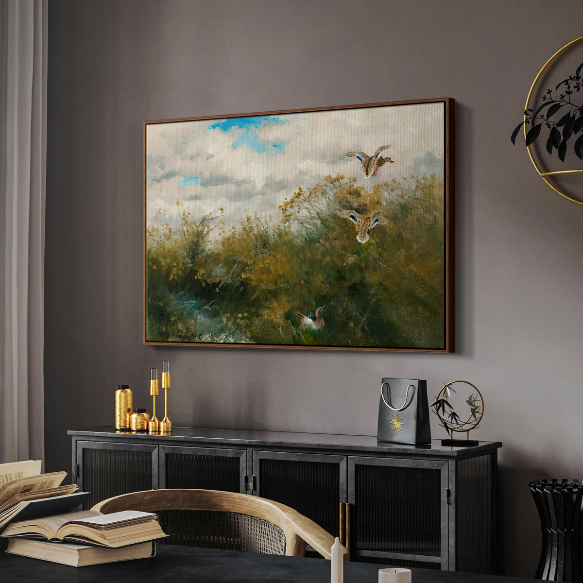 Wild Ducks (Grasänder), 1890 by Bruno Liljefors in a walnut floater framed canvas featuring a group of ducks foraging in natural marsh setting, displayed above a desk in a dark home office interior.