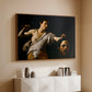 Walnut floater framed canvas of David with the Head of Goliath (Vienna Version), c. 1607 by Caravaggio, featuring a biblical scene of David gripping Goliath's head with dramatic lighting above a console cabinet in a minimalist entryway.