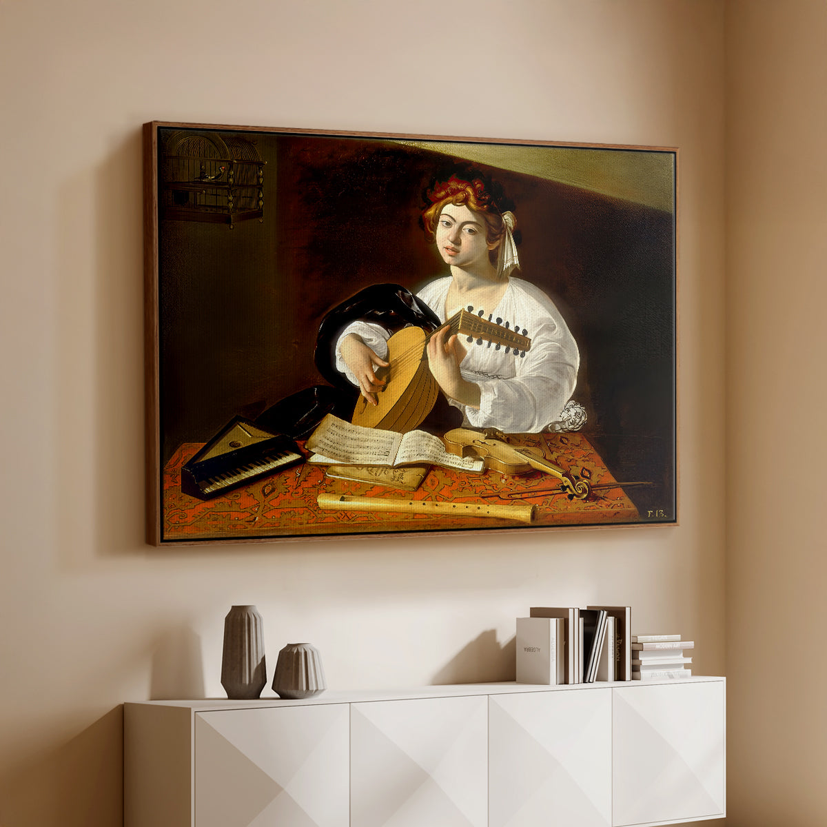 Walnut floater framed canvas of The Lute Player (Wildenstein Version), c. 1596 by Caravaggio, featuring a musician seated with lute and musical instruments on table above a console cabinet in a minimalist entryway.