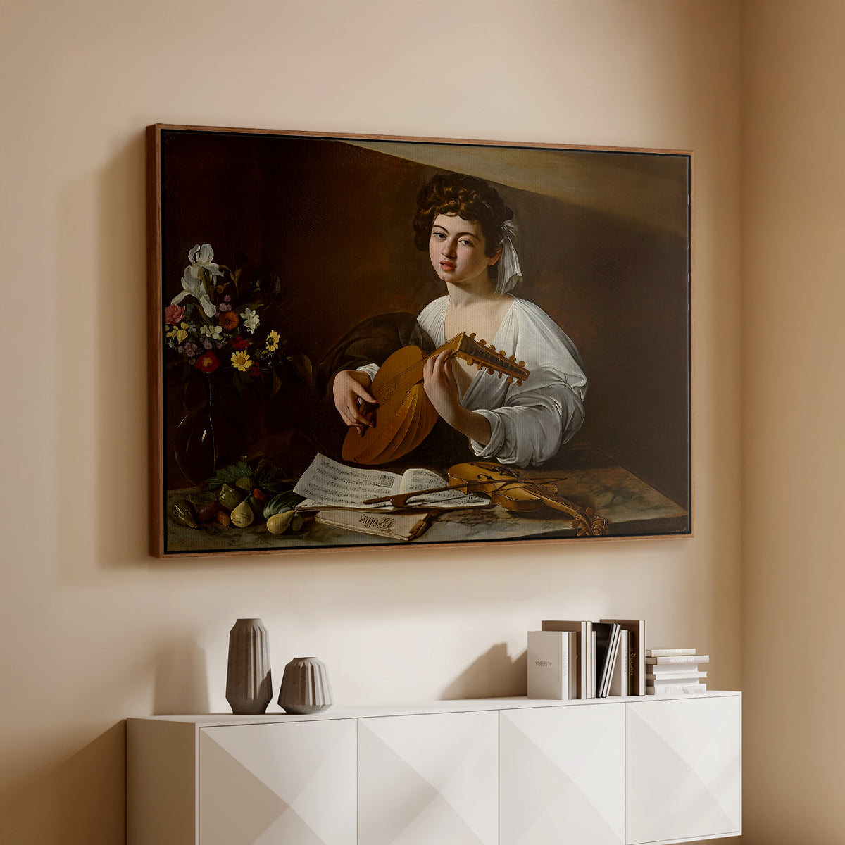 Walnut floater framed canvas of The Lute Player (Hermitage Version), c. 1596 by Caravaggio, featuring a portrait of lute player surrounded by still life arrangement above a console cabinet in a minimalist entryway.