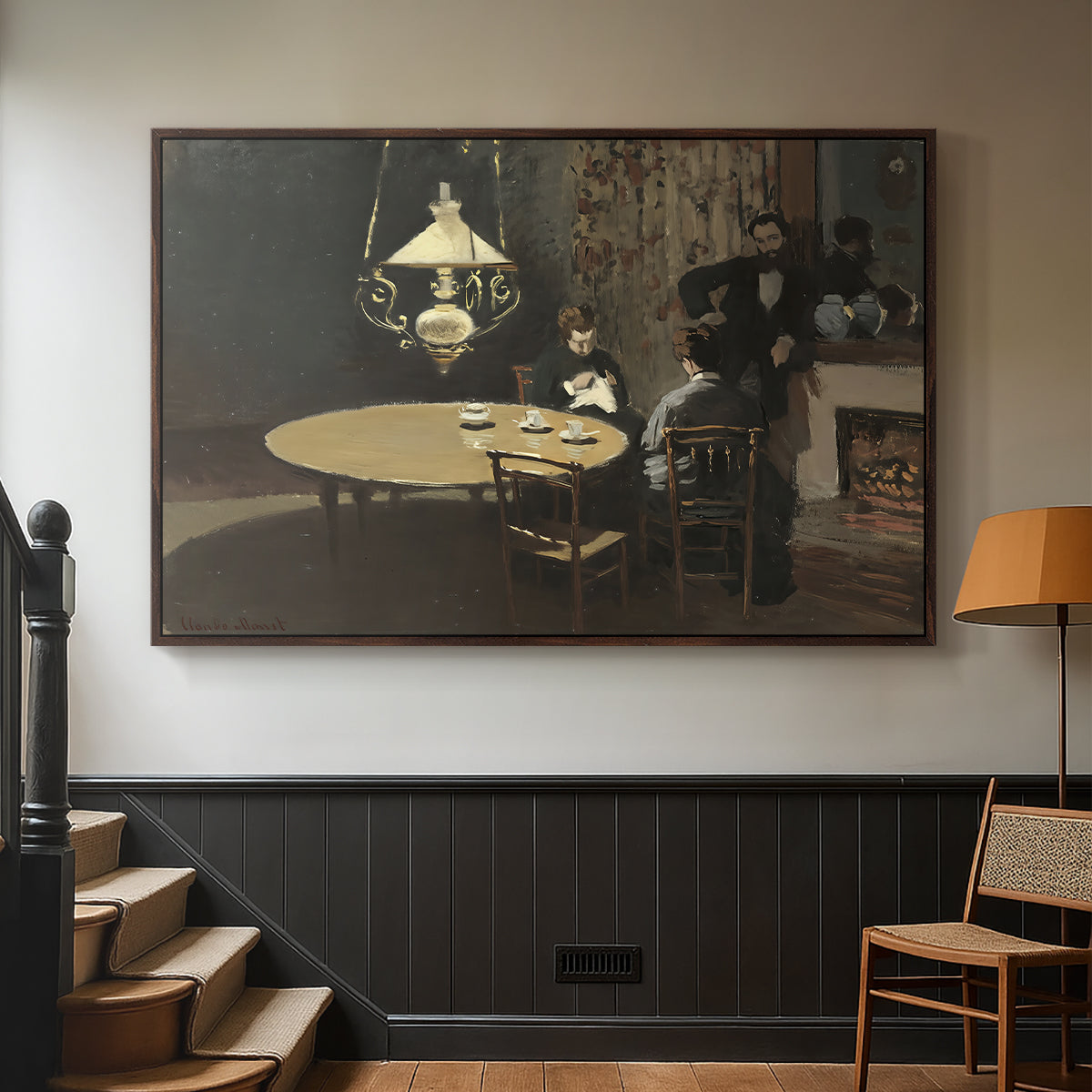 Walnut floater framed canvas featuring an intimate indoor scene with figure and table in low lighting, displayed in a hallway near a staircase.